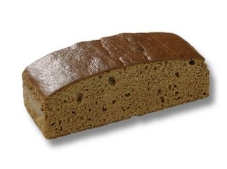 ontbijtkoek naturel. Met koekkruiden en honing bereid.Roggebloem, honing, en glucosestroop en koekkruiden.